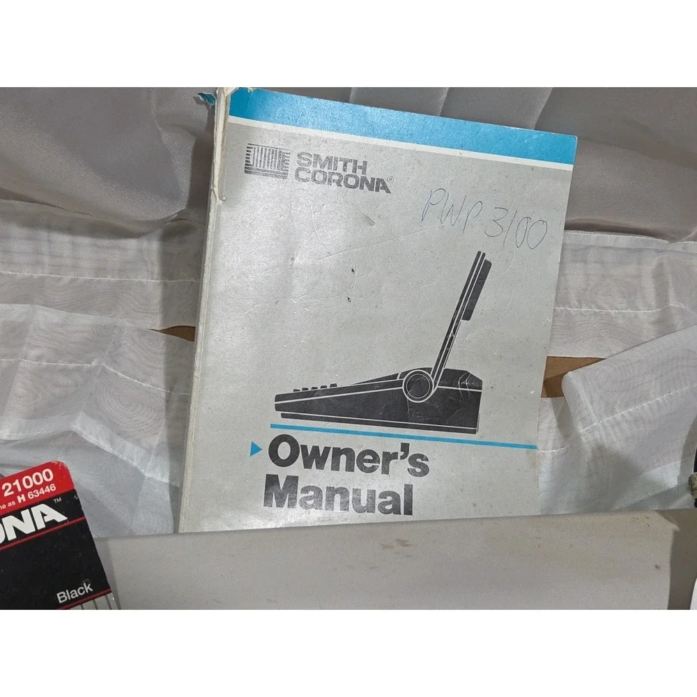 Smith Corona PWP 3100 Word Processor with accessories, manual, ribbons, and type